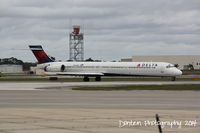 N925DN @ KSRQ - Delta Flight 2298 (N925DN) taxis at Sarasota-Bradenton International Airport - by Donten Photography