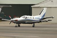 M-USCA @ EGBJ - Socata TBM 850 at Gloucestershire Airport on Day 1 of the 2014 Cheltenham Horse Racing Festival - by Terry Fletcher