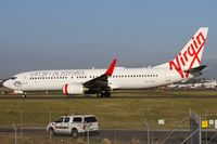 VH-VOK @ YSSY - taxiing to 34R - by Bill Mallinson