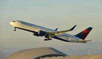 N1607B @ KLAX - Departing LAX on 25R - by Todd Royer
