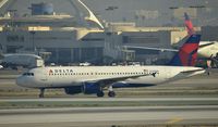 N328NW @ KLAX - Taxiing to gate at LAX - by Todd Royer