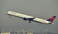 N590NW @ KLAX - Departing LAX on 25R - by Todd Royer