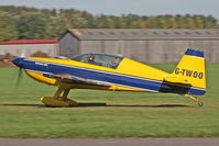 G-TWOO @ EGBR - Extra EA-300-200 at The Real Aeroplane Club's Pre-Hibernation Fly-In, Breighton Airfield, October 2013. - by Malcolm Clarke
