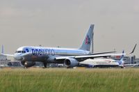 N174AA @ EGLL - Taxiing to 27L - by John Coates