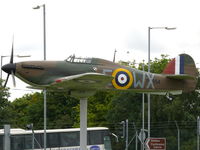 BAPC267 @ EGSU - This plastic Hurricane guards the gates at Duxford - by Alex Smit