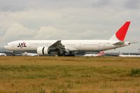 JA735J @ LFPG - Boeing 777-346ER, reverse thrust landing rwy 26L, Roissy Charles De Gaulle Airport (LFPG-CDG) - by Yves-Q