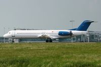 4O-AOM @ LFPG - Fokker 100, Landing Rwy 26L, Roissy Charles De Gaulle Airport (LFPG-CDG) - by Alexander Todt
