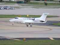 N301TG @ TPA - Embraer Phenom 300 - by Florida Metal