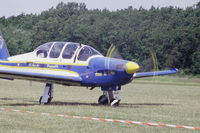 100 @ LFFQ - F-SEXQ taxiing after landing at La Ferté-Alais, 2004 airshow, as n° 2 of the Armée de l'Air patrouille Cartouche Dorée (GE-315). - by J-F GUEGUIN