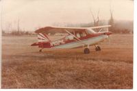 N9024L - My dad giving my wife her first airplane ride in the late 80's. - by Dale Waller