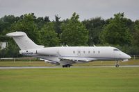 N300GP @ EGLF - Taxiing to depart - by John Coates