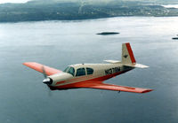 N1378W - 1378W in flight over the coast of Maine - by John Foster