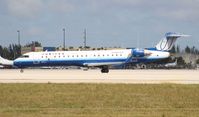 N521LR @ MIA - United Express CRJ-700