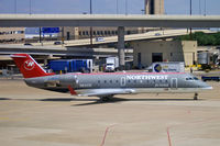 N8423C @ DFW - N8423C Bomb CL-600-2B19 DFW 29-6-06 - by Brian Johnstone