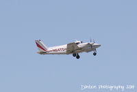 N64TD @ KSRQ - Piper Twin Commanche (N64TD) departs Sarasota-Bradenton International Airport - by Donten Photography