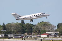 N642AC @ KSRQ - Beechcraft Beechjet (N642AC) departs Sarasota-Bradenton International Airport - by Donten Photography
