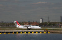 EI-RJZ @ EGLC - Taxing for take-off from London City. - by Jonathan Allen