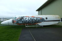 N25AG @ EGBP - outside the ASI hangar painted with some intresting graffiti artwork - by Chris Hall