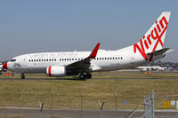 VH-VBY @ YSSY - taxiing to 34R - by Bill Mallinson