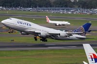 N199UA @ YSSY - rotating from 34L - by Bill Mallinson