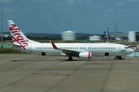 VH-VUS @ YBBN - At Brisbane - by Micha Lueck