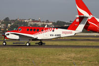 VH-AMR @ YSSY - taxiing to 34R - by Bill Mallinson