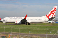 VH-YIV @ YSSY - taxiing to 34R - by Bill Mallinson