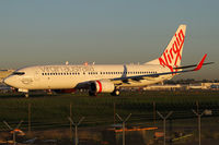 VH-YIH @ YSSY - taxiing to 34R - by Bill Mallinson