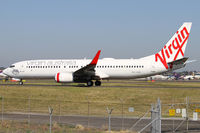 VH-VOK @ YSSY - taxiing to 34R - by Bill Mallinson