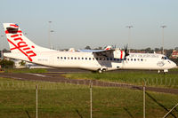 VH-FVZ @ YSSY - taxiing from 34R - by Bill Mallinson
