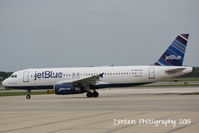 N583JB @ KSRQ - JetBlue Flight 164 (N583JB) Bluesville departs Sarasota-Bradenton International Airport enroute to John F Kennedy International Airport - by Donten Photography