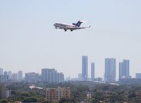 N905AJ @ MIA - Amerijet 727-200 over Miami skyline - by Florida Metal