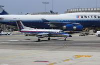 N561SW @ KLAX - SkyWest Airlines. Embraer EMB-120ER Brasilia. N561SW cn 120335. Los Angeles - International (LAX KLAX). Image © Brian McBride. 11 May 2013 - by Brian McBride