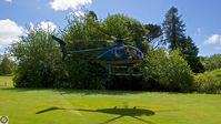 G-BIOA - Landing at Private site just outside Plymouth, Devon. Heavily disguised in front of the foliage - by Andy Carter / Dartmouthphotography