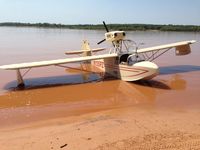 N135PZ - Day after heavy Spring rain muddied the lake, but didn't distract from playing on the water! - by Bob Ibanez