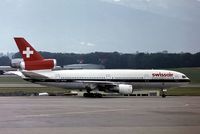 HB-IHF @ LSGG - McDonnell Douglas DC-10-30 [46580] (Swissair) Geneva~HB 05/06/1982. Taken from a slide. - by Ray Barber