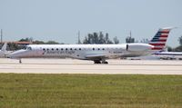 N928AE @ MIA - Eagle E145LR - by Florida Metal