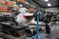 N2897S @ FA08 - Restoration work of a P-38 Lightning at Fantasy of Flight