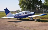 G-BATW @ EGHH - Parked off Whisky - by John Coates