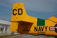 N128KA @ LAL - 1958 North American T-28B, N128KA, at 2014 Sun n Fun, Lakeland Linder Regional Airport, Lakeland, FL - by scotch-canadian