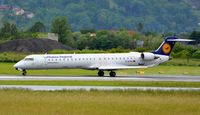 D-ACKH @ LOWG - Crj-900, Take-off at LOWG - by Paul H
