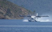 TC-KHC - Taking off from Hisaronu Limani, Turkey - by Mel Nichols