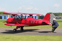 G-MVZX @ EGBR - Man powered parking! Murphy Renegade Spirit UK at The Real Aeroplane Club's Biplane and Open Cockpit Fly-In, Breighton Airfield UK, June 1st 2014. - by Malcolm Clarke