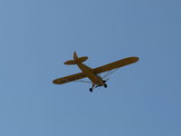 N23266 @ SZP - 1939 Piper J3C-65 CUB, Continental A&C65 65 Hp, takeoff climb Rwy 22, a 75 year old airplane not quite as old as the old photographer - by Doug Robertson