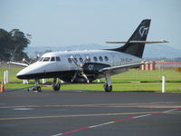 ZK-ECJ @ NZAA - Nice sunny long shot on cargo apron - by magnaman