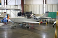 N427K @ KIOW - Among aircraft displayed in a hangar during the air show