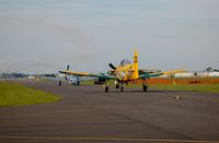 N128KA @ LAL - North American F-51D, N151TP (Sweetie Face) and 1958 North American T-28B, N128KA, at 2014 Sun n Fun, Lakeland Linder Regional Airport, Lakeland, FL - by scotch-canadian