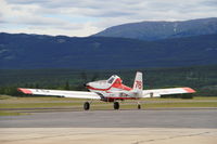 C-GSYF @ CYXY - Taxiing from the fire tanker base at Whitehorse, Yukon. - by Murray Lundberg