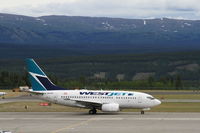 C-GPWS @ CYXY - Taxiing to the terminal at Whitehorse, Yukon. - by Murray Lundberg