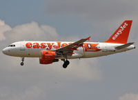 G-EZBG @ LFBO - Landing rwy 32L with additional Hamburg logojet - by Shunn311